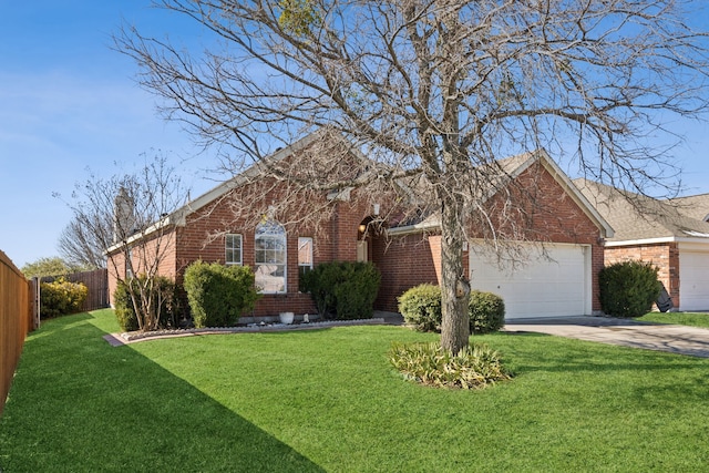 view of front facade featuring a garage and a front yard