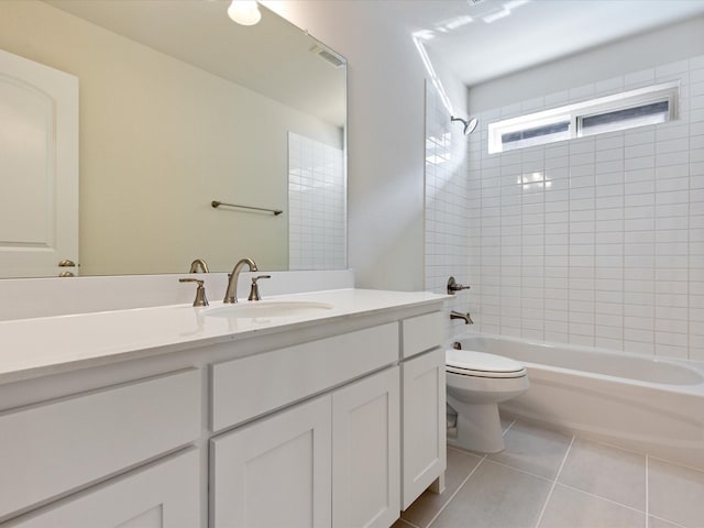 full bathroom with toilet, tile patterned flooring, washtub / shower combination, and vanity