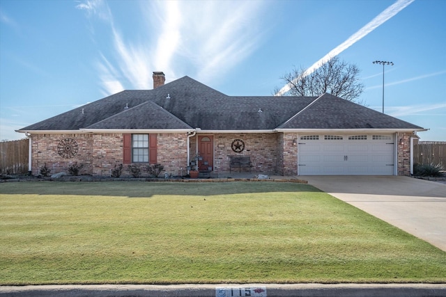 115 Juanita Ave, Wills Point, TX 75169 - view of front of house with an attached garage, roof with shingles, brick siding, driveway, and a chimney