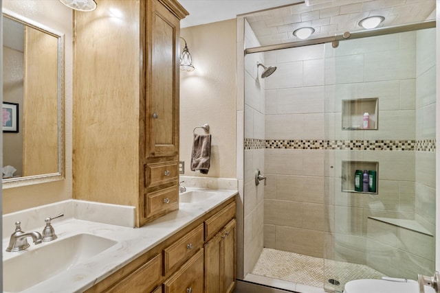 bathroom featuring an enclosed shower, vanity, and toilet