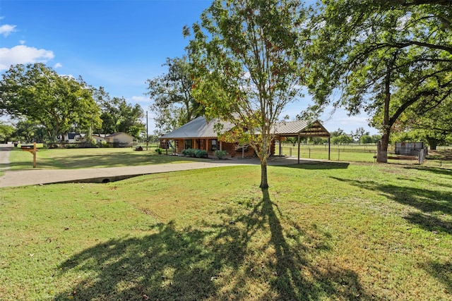 view of yard with a carport