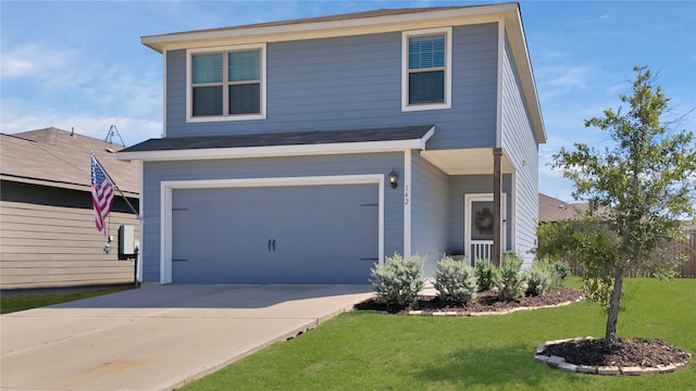 front facade with a front yard and a garage