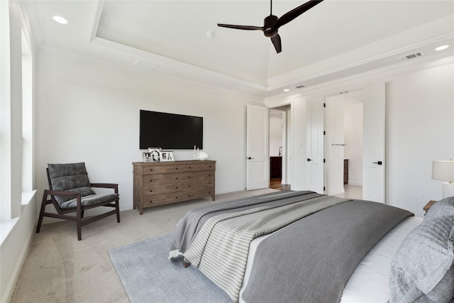 bedroom featuring recessed lighting, light colored carpet, visible vents, ornamental molding, and a raised ceiling