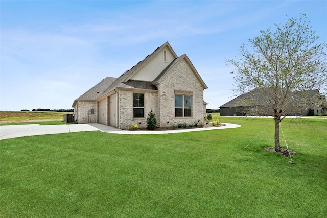 french provincial home with a garage, central air condition unit, and a front lawn