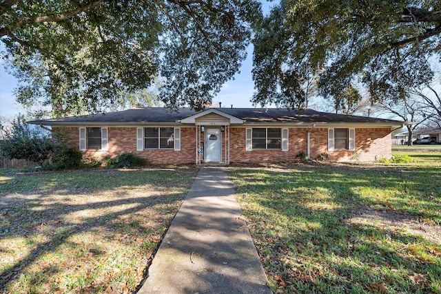 ranch-style house with a front yard