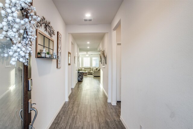 dining room with beverage cooler and dark hardwood / wood-style floors