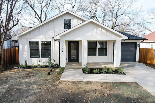 modern farmhouse style home featuring a garage