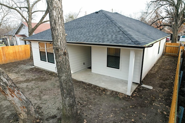 rear view of property with a patio area