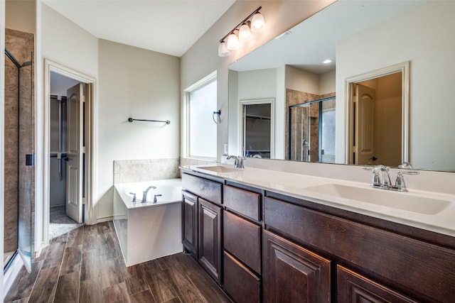 bathroom with plus walk in shower and vanity