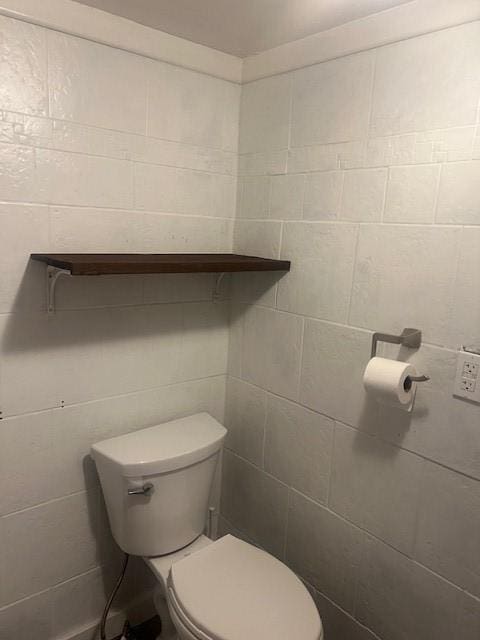 bathroom featuring toilet