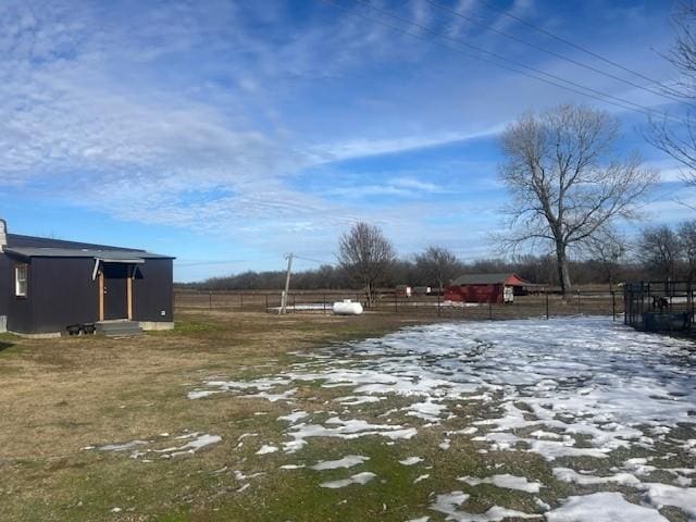 view of yard covered in snow