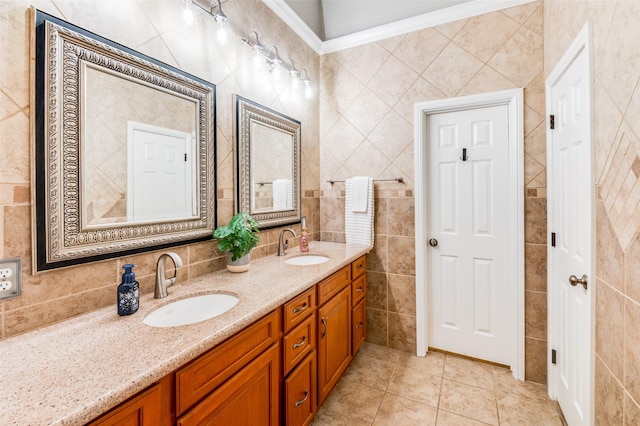 bathroom featuring tile patterned floors, vanity, decorative backsplash, tile walls, and crown molding