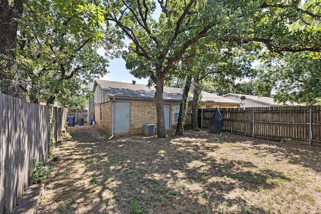 view of yard with central air condition unit