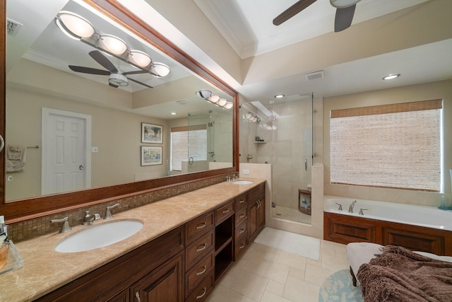 bathroom with crown molding, tile patterned floors, ceiling fan, shower with separate bathtub, and vanity