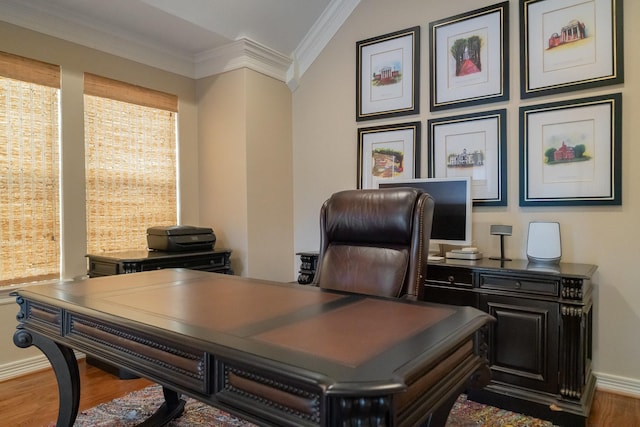 office area with hardwood / wood-style flooring and ornamental molding