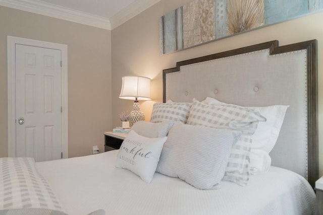 bedroom with ornamental molding