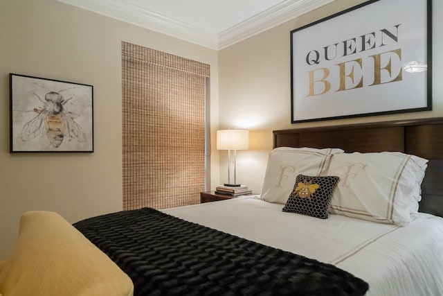 bedroom with crown molding