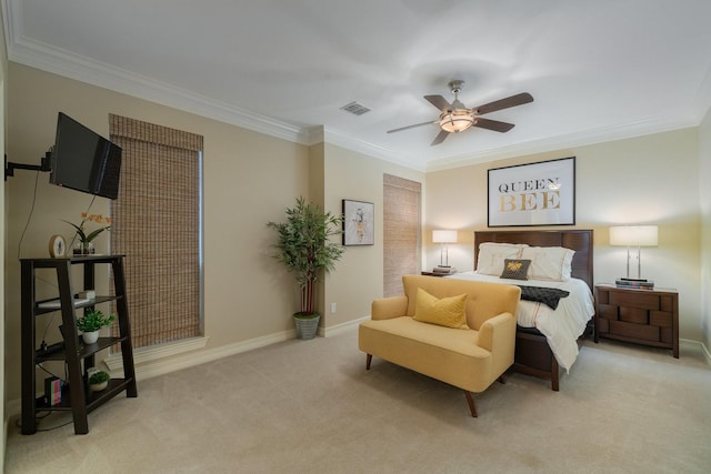 bedroom featuring ceiling fan, light carpet, and ornamental molding