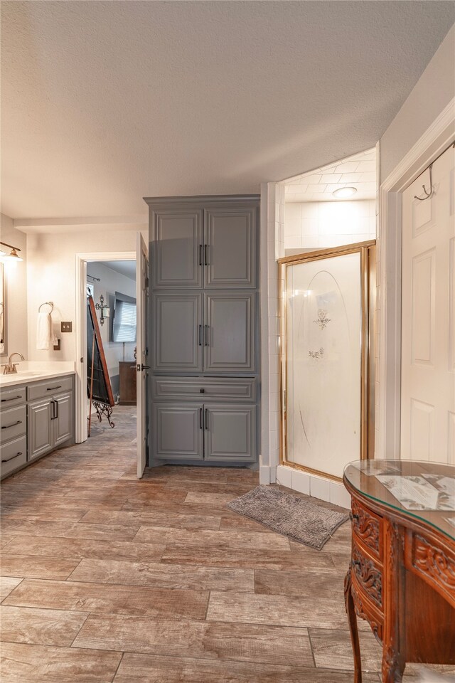 interior space with light hardwood / wood-style floors and sink