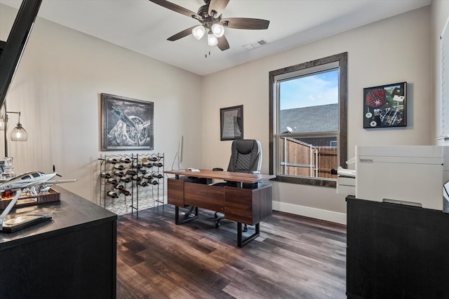 office featuring ceiling fan and dark hardwood / wood-style floors