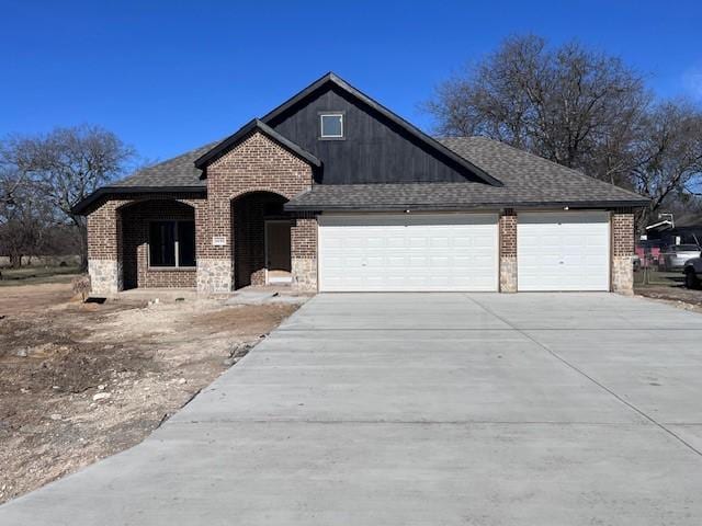 view of front of property with a garage