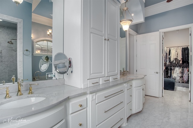 bathroom featuring vanity and ornamental molding