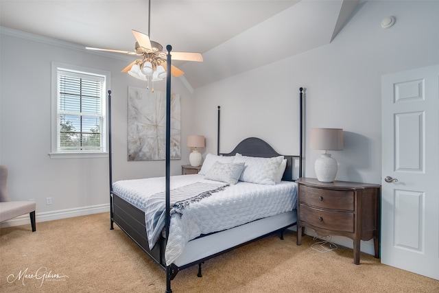 carpeted bedroom featuring ceiling fan and lofted ceiling