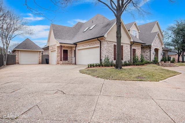 view of front of home with a garage and a front yard