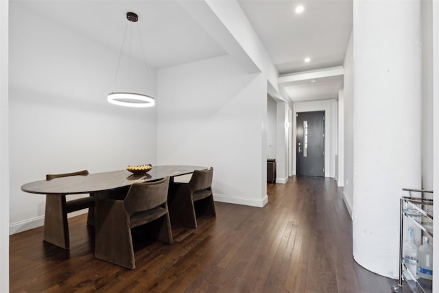 dining room featuring dark wood-type flooring