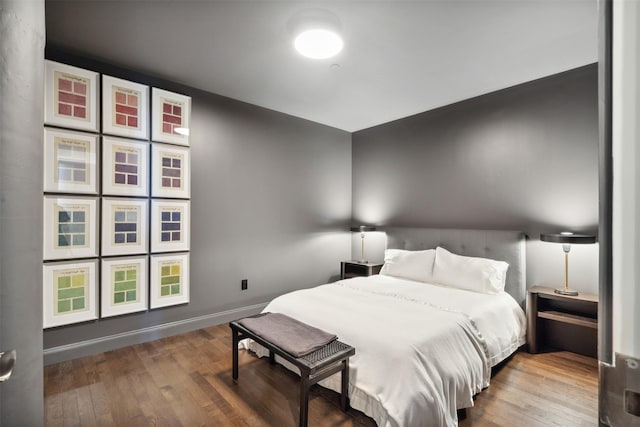 bedroom featuring wood-type flooring