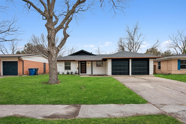 ranch-style house with a garage and a front lawn