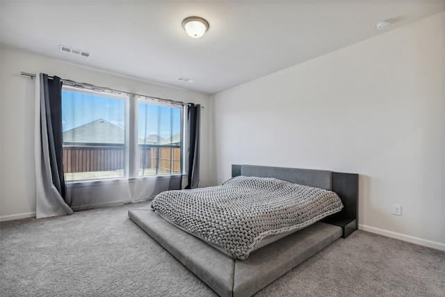 bedroom featuring carpet flooring