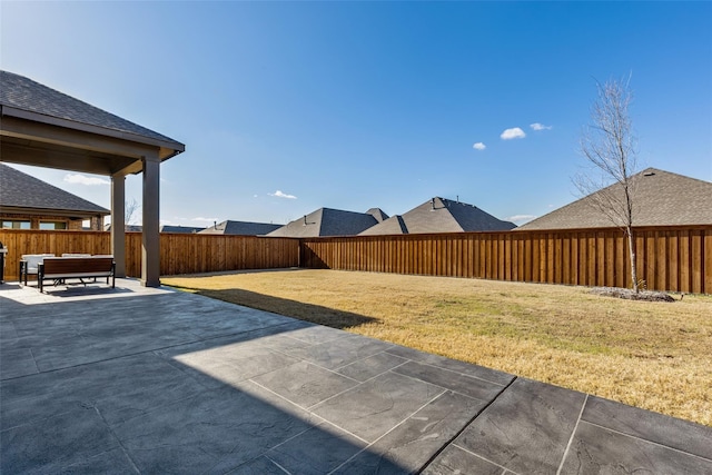 view of yard with a patio area