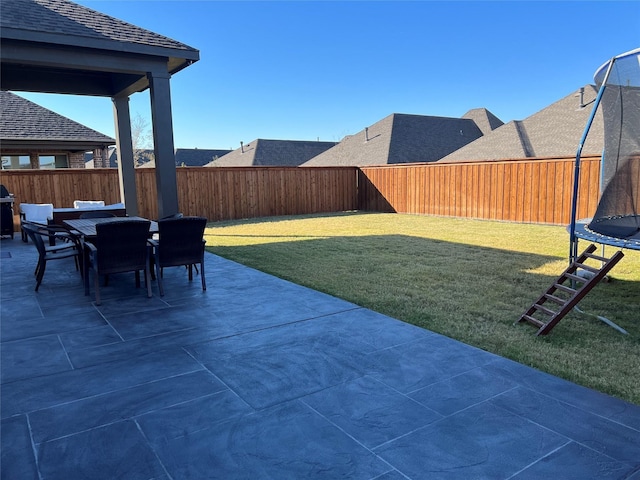 view of patio with a trampoline