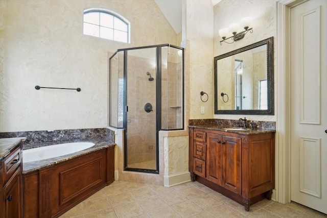 bathroom featuring vanity, tile patterned floors, and independent shower and bath