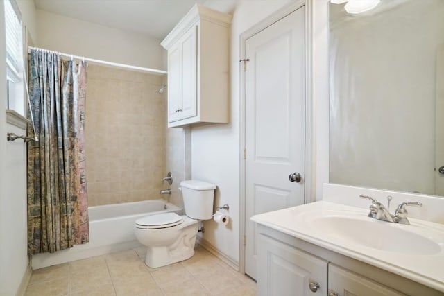 full bathroom featuring toilet, tile patterned flooring, shower / bath combination with curtain, and vanity