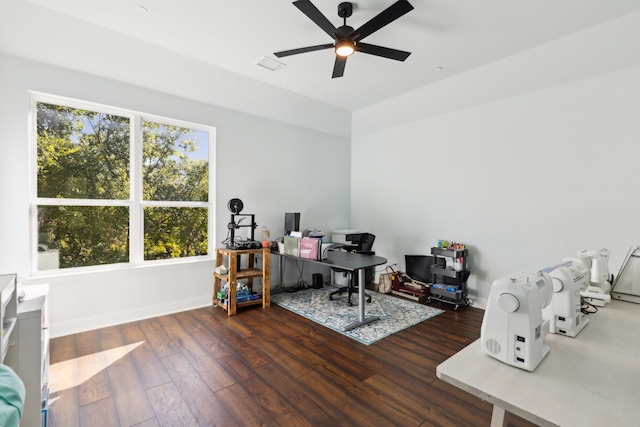 office space with ceiling fan and dark hardwood / wood-style floors