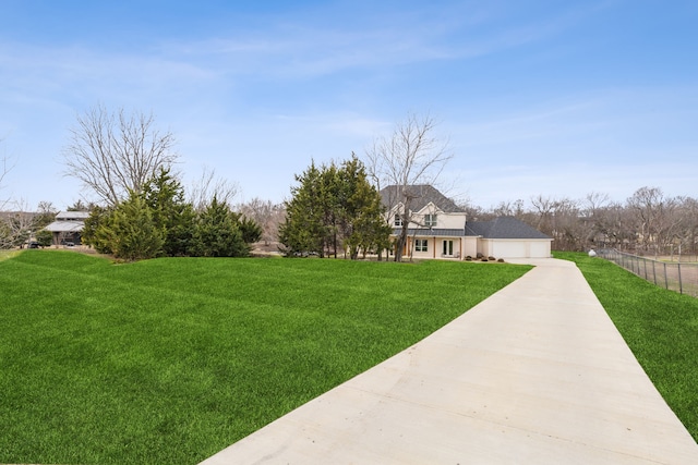 view of yard featuring a garage