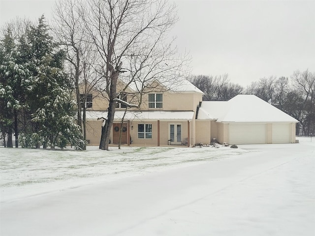 view of front of property with a garage