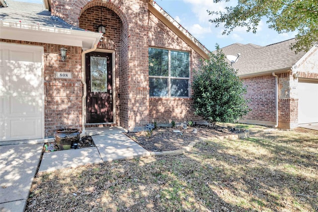 entrance to property with a garage