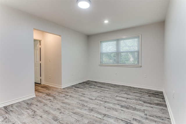 empty room with light wood-type flooring