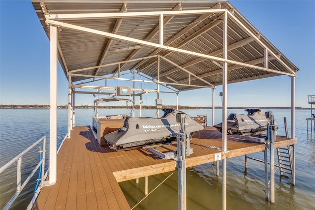 dock area with a water view