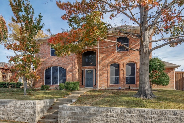 view of front facade with a front lawn