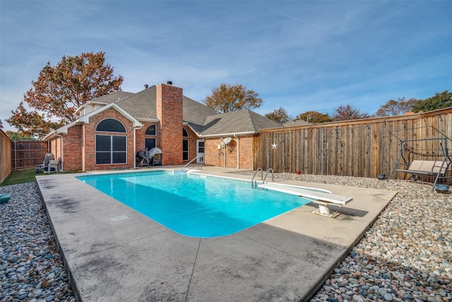 view of pool featuring a patio