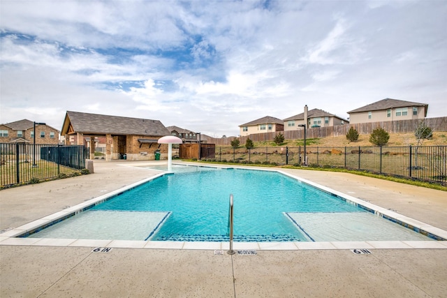 view of swimming pool featuring a patio