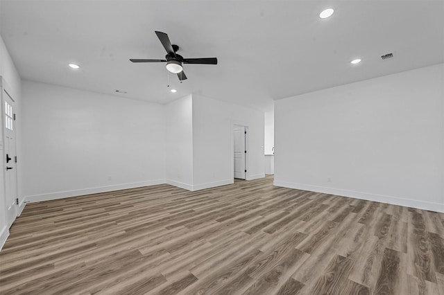 unfurnished living room with light hardwood / wood-style floors and ceiling fan