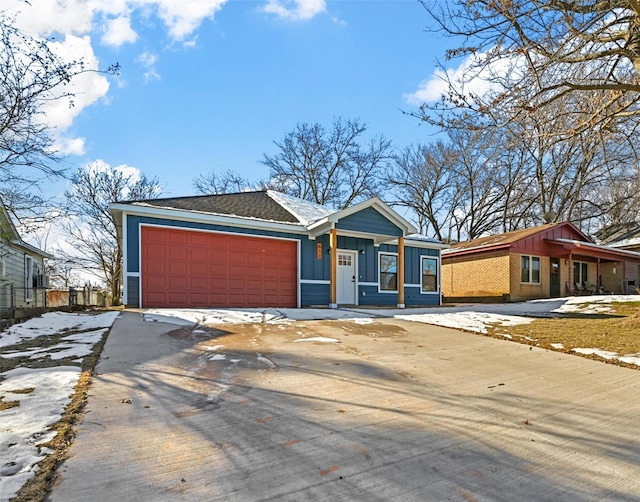 ranch-style home with a garage