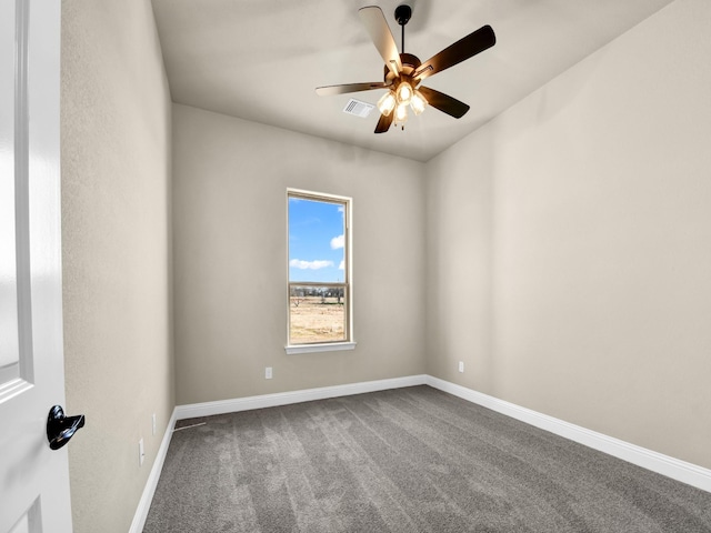 carpeted empty room featuring ceiling fan