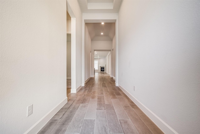 hall with light hardwood / wood-style floors