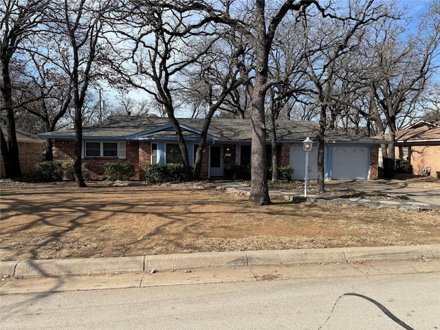 ranch-style home with a garage